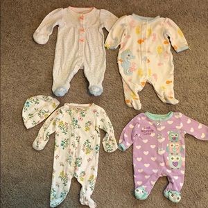 Carter’s Newborn baby girl sleepers set